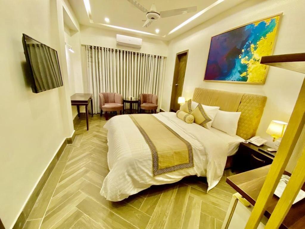 Shelton'S Rezidor House Hotel Peshawar Esterno foto